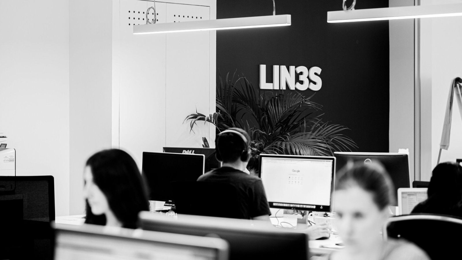 Professionals working at the LIN3S digital business consultancy offices